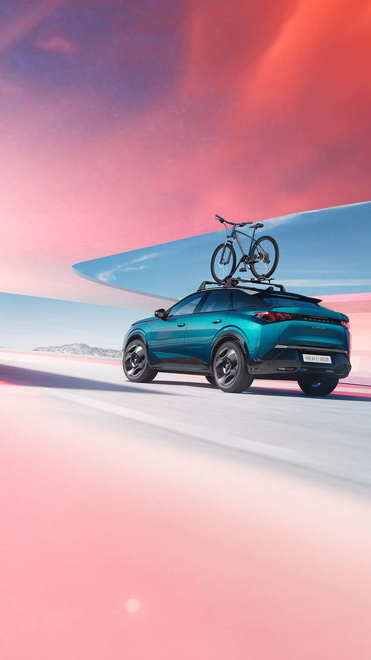 Peugeot e-3008 з тримачем для велосипеда на даху