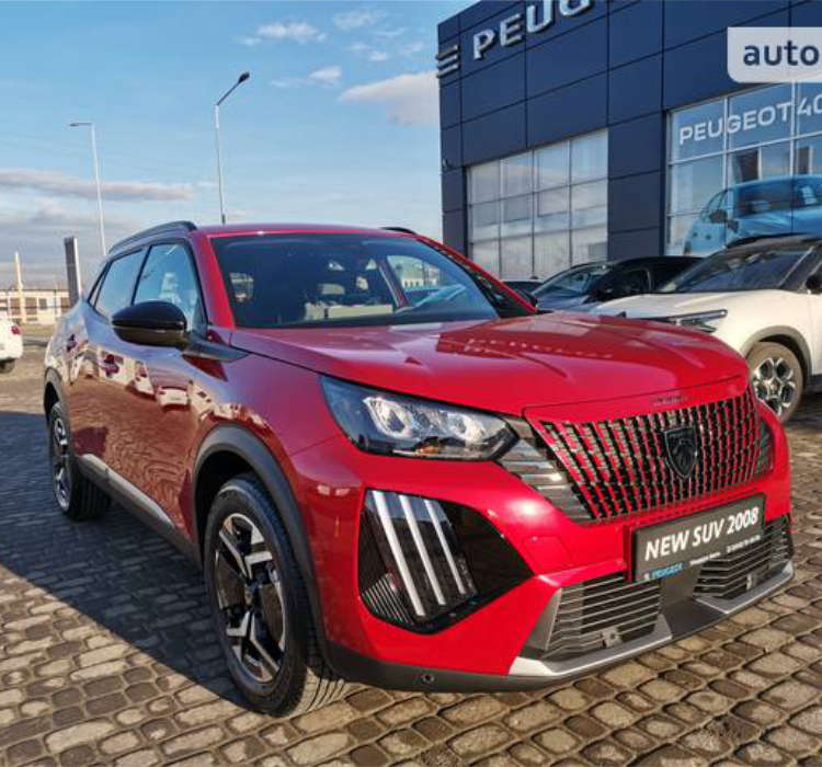 Peugeot 2008 червоного кольору біля автосалону «Талісман-Автостиль» у Краматорську